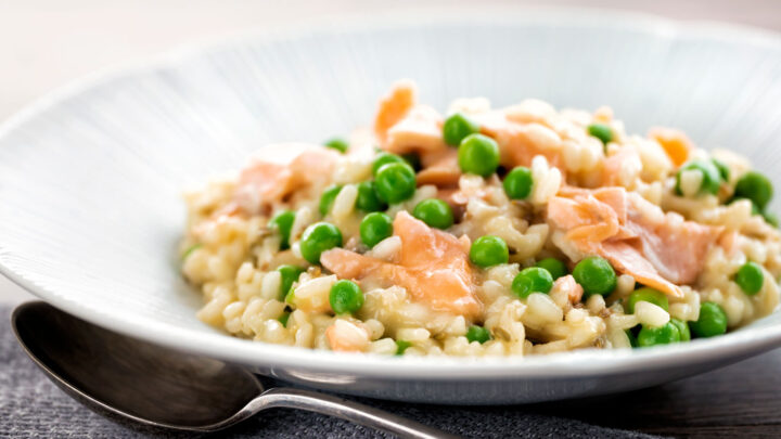 Creamy salmon risotto with green peas and fennel seeds.