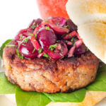 Shredded duck burgers topped with cherry salsa.
