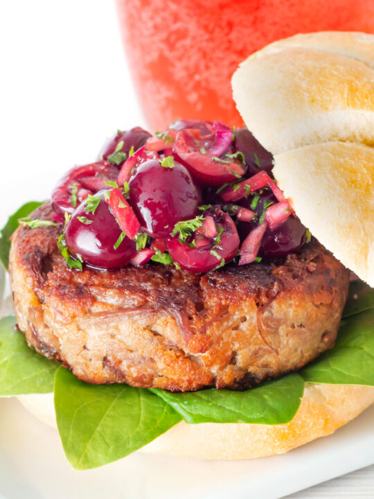 Shredded duck burgers topped with cherry salsa.