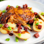 Spanish pork chops with chorizo sausage, broad beans and potatoes.