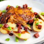 Spanish pork chops with chorizo sausage, broad beans and potatoes.