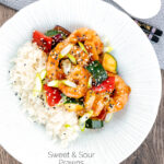 Overhead sweet and sour prawns or shrimp with vegetables and rice featuring a title overlay.