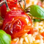 Close up tomato risotto with basil and roasted tomatoes featuring a title overlay.