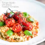 Tomato risotto with basil and roasted tomatoes served in a white bowl featuring a title overlay.