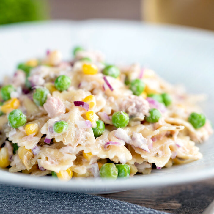 Tuna pasta salad with creamy mayo peas, corn and red onion.