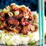 General Tso's chicken fakeaway recipe served on white rice.
