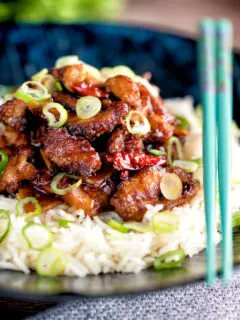 General Tso's chicken fakeaway recipe served on white rice.