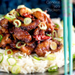 General Tso's chicken fakeaway recipe served on white rice featuring a title overlay.
