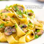 Garlic mushroom pappardelle with balsamic vinegar featuring a title overlay.