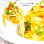 Pasta carbonara with peas and bacon picked up with a fork featuring a title overlay.