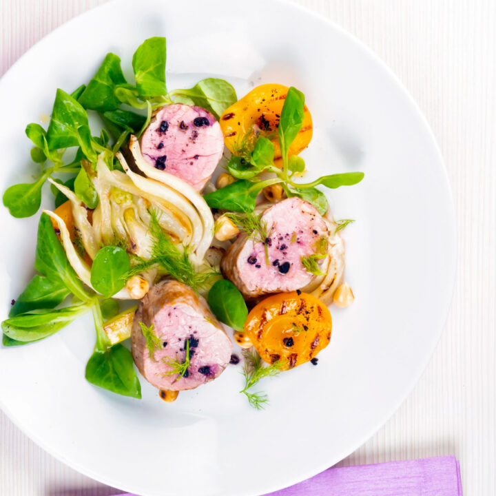 Roast pork tenderloin with apricot, fennel, hazelnuts and Tasmanian pepperberry.