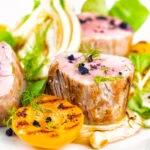 Roast pork tenderloin with apricot, fennel and Tasmanian pepperberry.