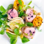 Overhead roast pork tenderloin with apricot, fennel and Tasmanian pepperberry.