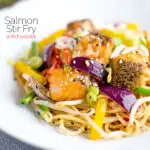 Salmon stir fry with egg noodles and vegetables featuring a title overlay.