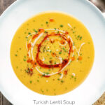 Overhead Turkish lentil soup or mercimek corbasi with paprika butter and tahini swirls featuring a title overlay.