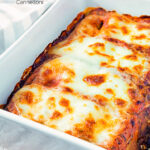 Goats cheese cannelloni with spinach served in a baking dish featuring a title overlay.