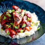Honey chilli chicken made with chicken tenders, red peppers and spring onions.