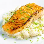 Pan fried honey mustard salmon served on celeriac mash.