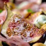 Close up roasted figs served in a salad.