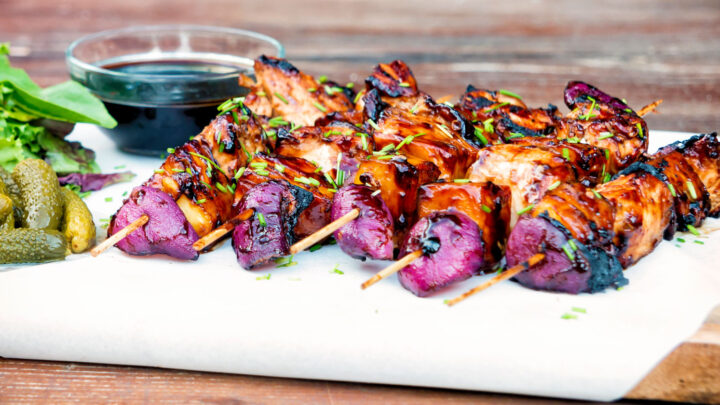 BBQ chicken skewers with pineapple & red onion with a sweet & sour glaze.