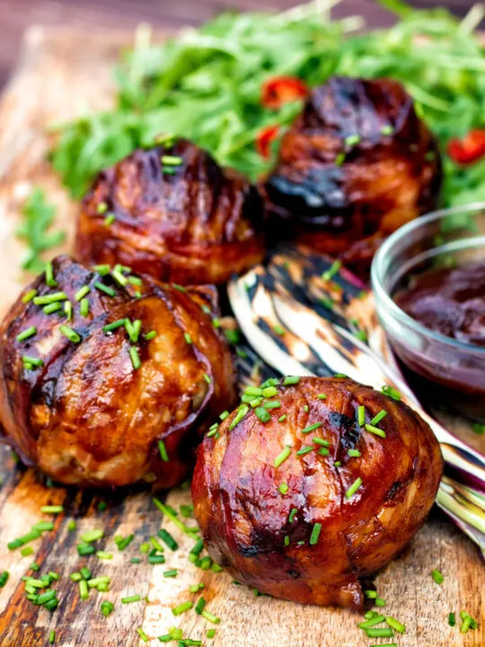 Stuffed mushrooms wrapped in bacon & BBQ sauce glaze.