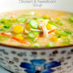 Chinese style chicken and sweetcorn soup served in a flower decorated bowl featuring a title overlay.