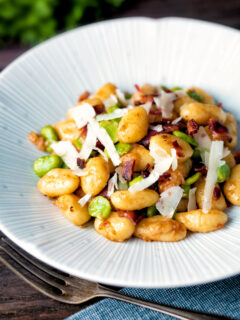 Pan fried gnocchi with bacon, broad beans and parmesan shavings.