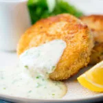 White parsley sauce served with a smoked haddock fishcake.