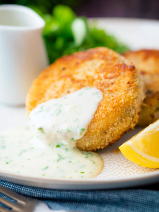 White parsley sauce served with a smoked haddock fishcake.