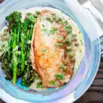 Overhead pan fried skate wings served with a prosecco and caper butter sauce.