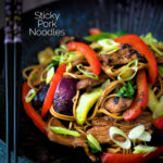 Hoisin pork stir fry with red peppers, onions and pak choi featuring a title overlay.