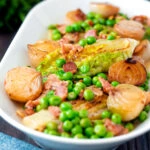 Petit pois a la Francaise or French braised peas and lettuce with bacon and onions.