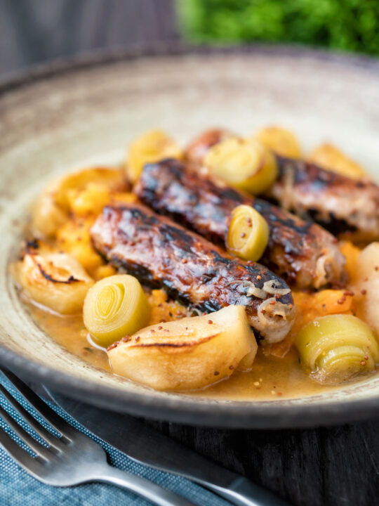 Sausage and apple casserole with leeks and a mustard and cider sauce..