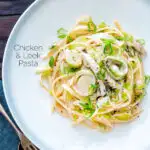 Overhead chicken and leek pasta with linguini in a mustard and creme fraiche sauce featuring a title overlay.