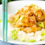 Chinese crispy lemon chicken served with rice.