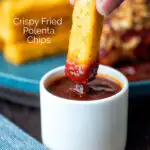 Crispy Fried polenta chip dipped in a pot of BBQ sauce featuring a title overlay.