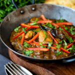 Garlic chilli chicken Indian style curry served with fresh chilli and coriander.