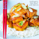 Korean gochujang tofu stew with kimchi served with white rice featuring a title overlay.