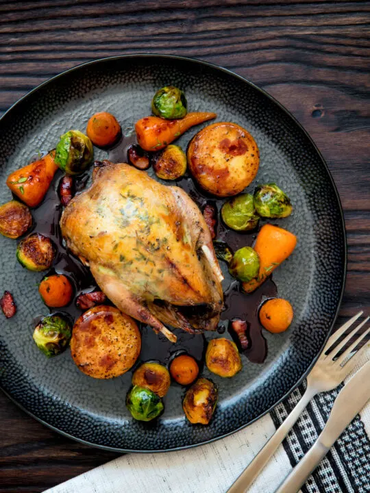 Miso roast Brussel sprouts served as part of a roast dinner.