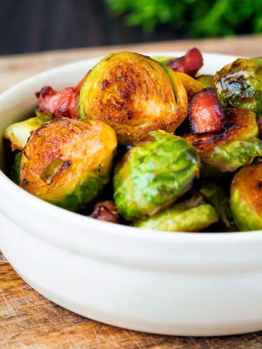 Close up roast miso Brussel sprouts with bacon.
