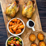 Overhead roast partridges served on a board with vegetables featuring a title overlay.