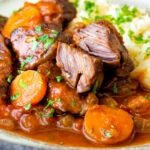 Moshari kokkinisto a Greek beef and tomato stew showing the texture of the beef.