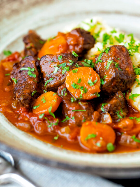 Moshari kokkinisto a Greek beef and tomato stew served with celeriac mash.