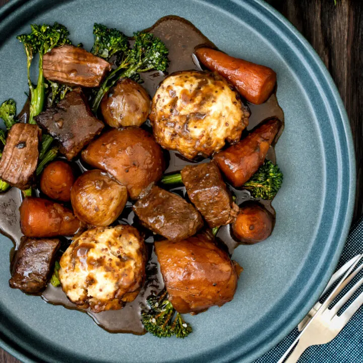 British beef and ale stew with dumplings, carrots and potatoes.