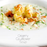 Chunky creamy cauliflower soup with a paprika garnish featuring a title overlay.