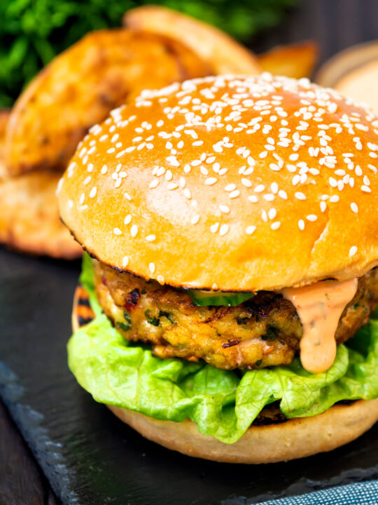 Spicy cod fish burger with sriracha mayonnaise.