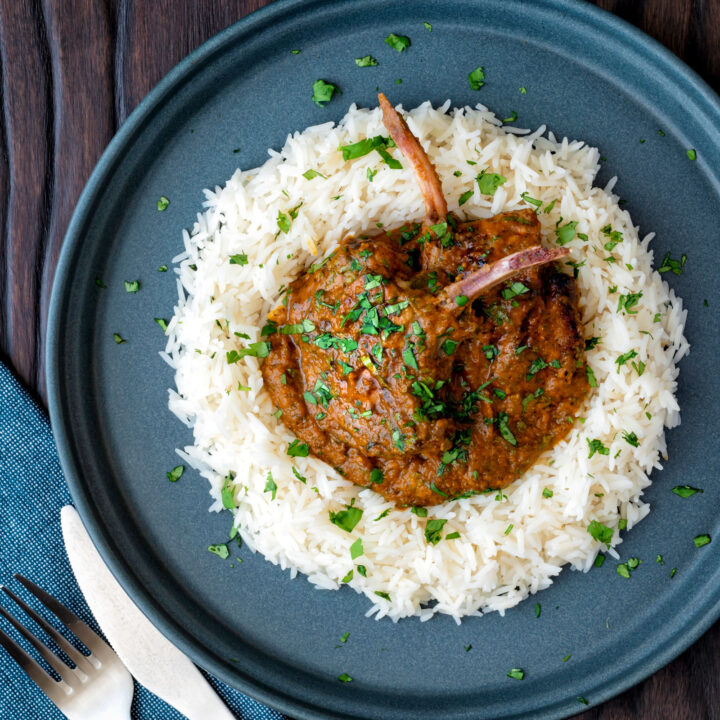 Indian inspired lamb chop curry in a sour masala style sauce served with rice.