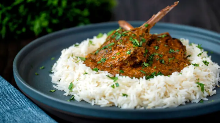 Indian inspired lamb chop curry in a sour masala style sauce served with rice.