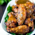 Spicy mango habanero hot wings served with extra dipping sauce.