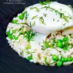 Close up smoked haddock risotto with peas topped with a poached egg and fresh dill featuring a title overlay.